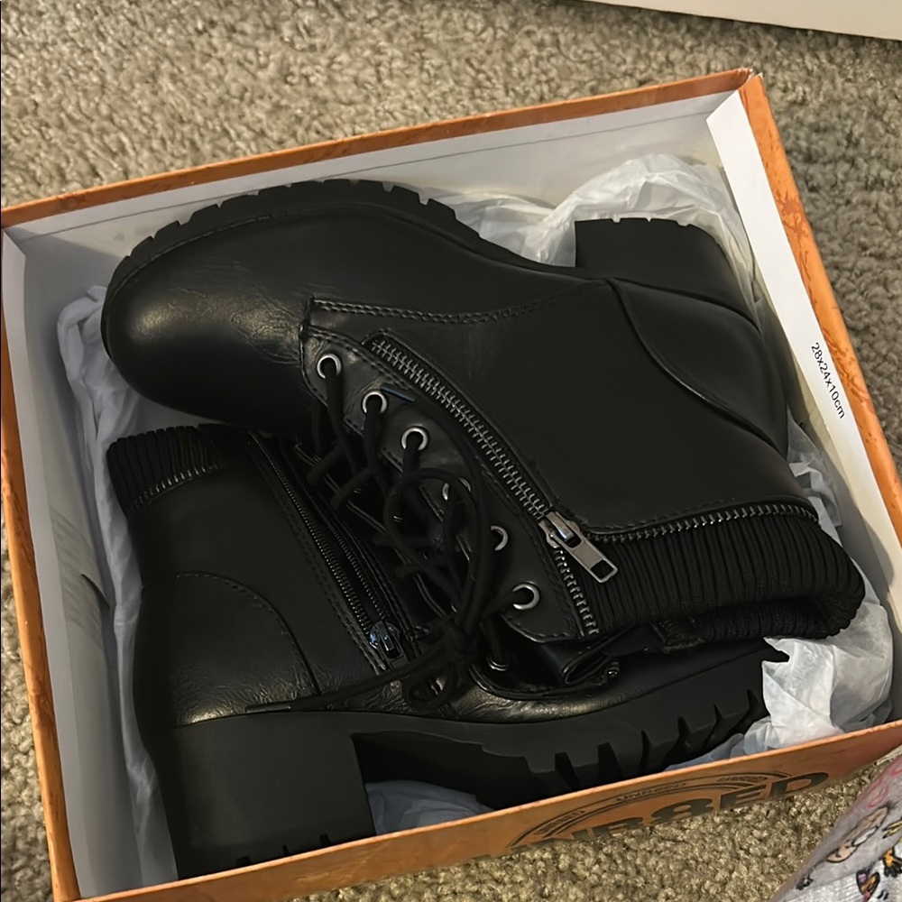 Black Leather Boots with Sleek Design
